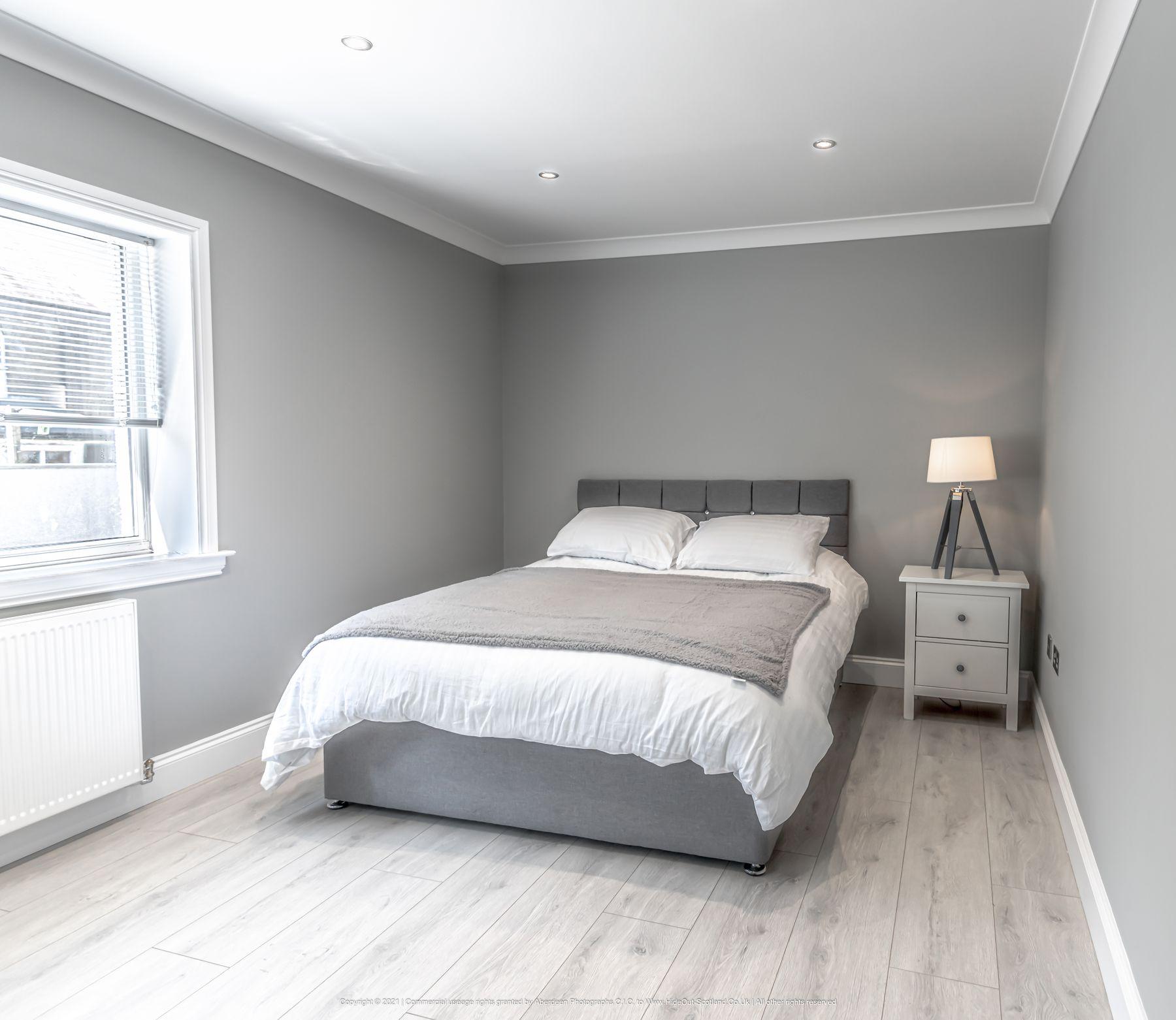 The bedroom, with the king bed